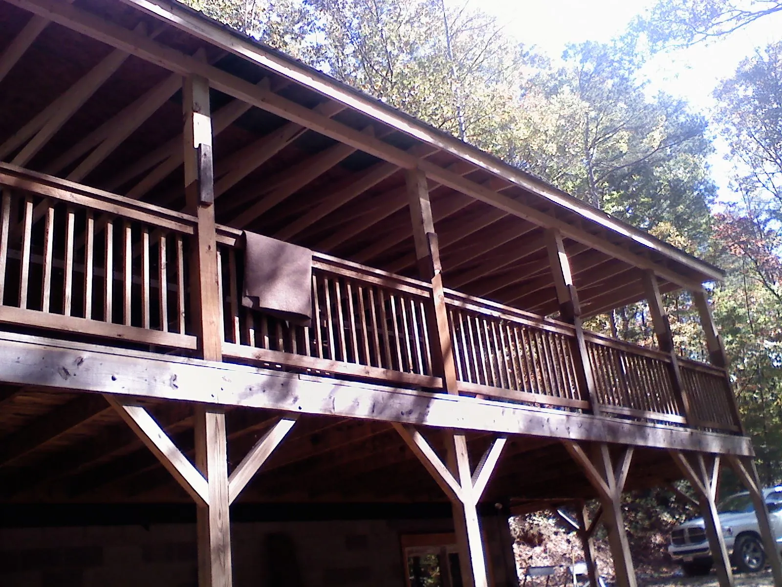 Timber framing under a new elevated porch and deck — Roof Leak Repair in Kaysville by Roofing Brothers